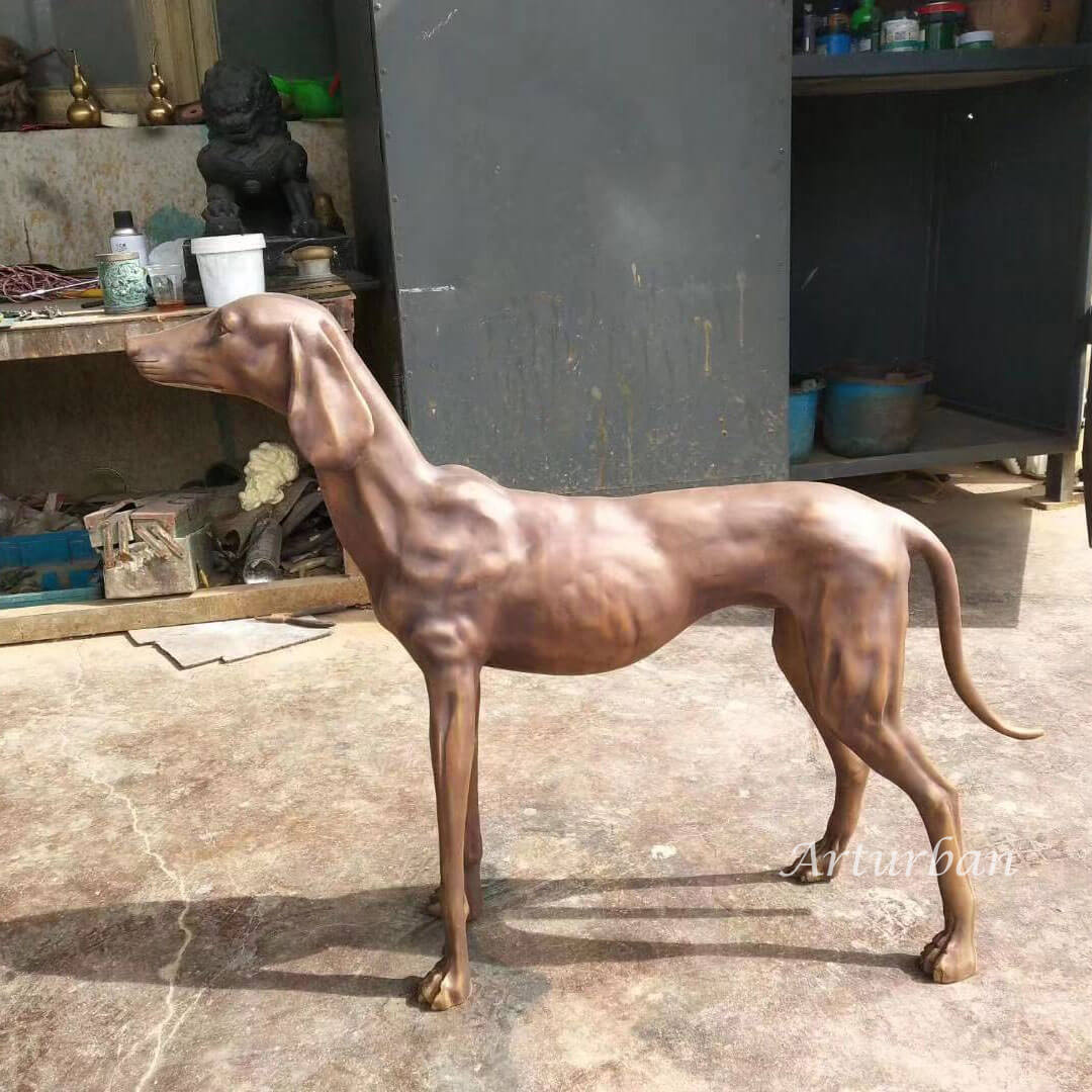 side of life size greyhound statue