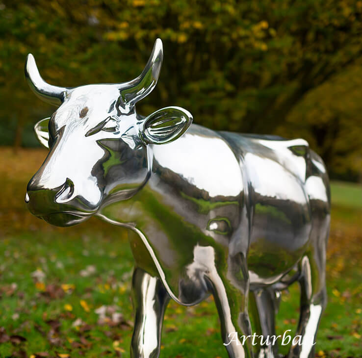 metal life size cow statue