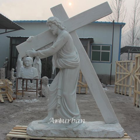 jesus carrying cross statue