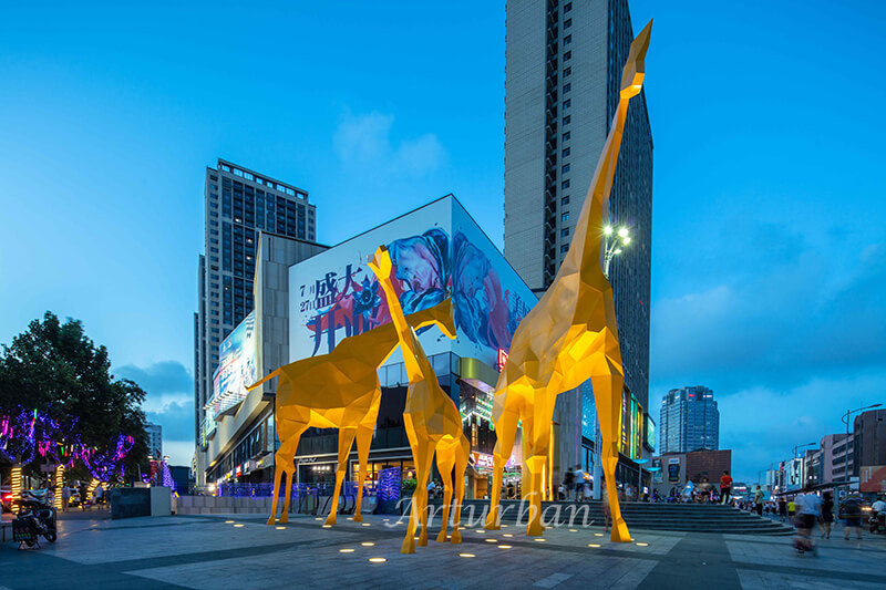 yellow giraffe sculpture