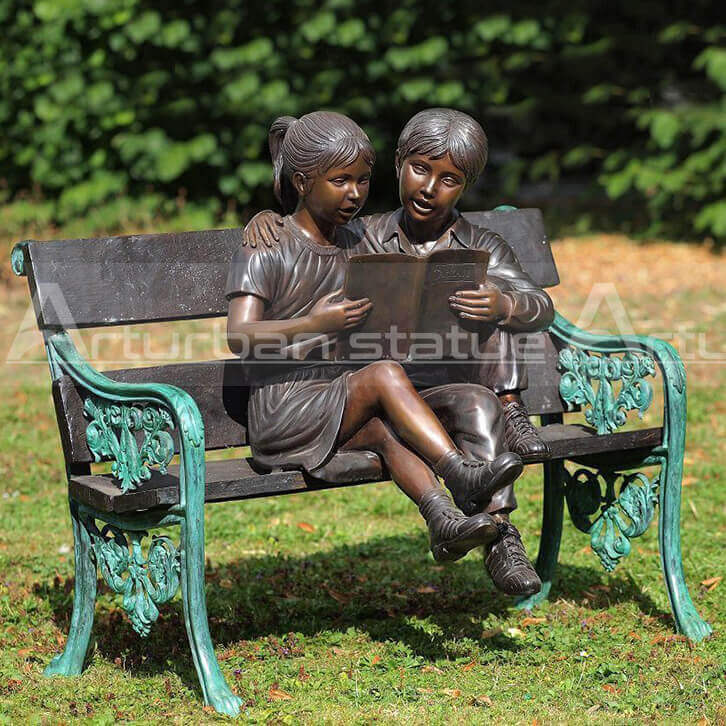 Boy and Girl Reading Book Statue