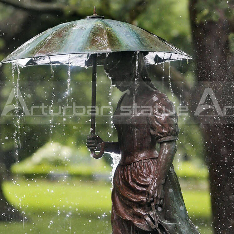 girl with umbrella bronze fountain