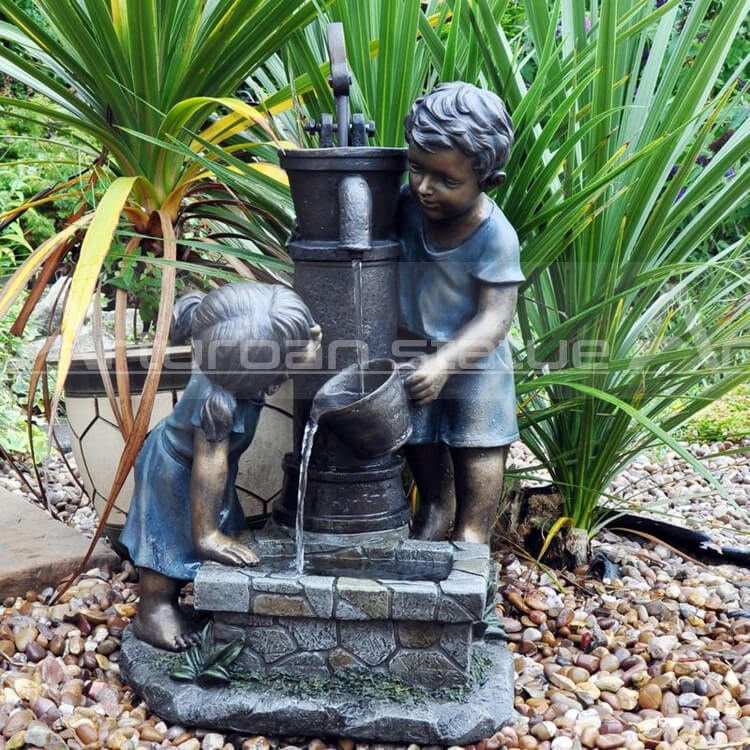 bronze boy girl fountain