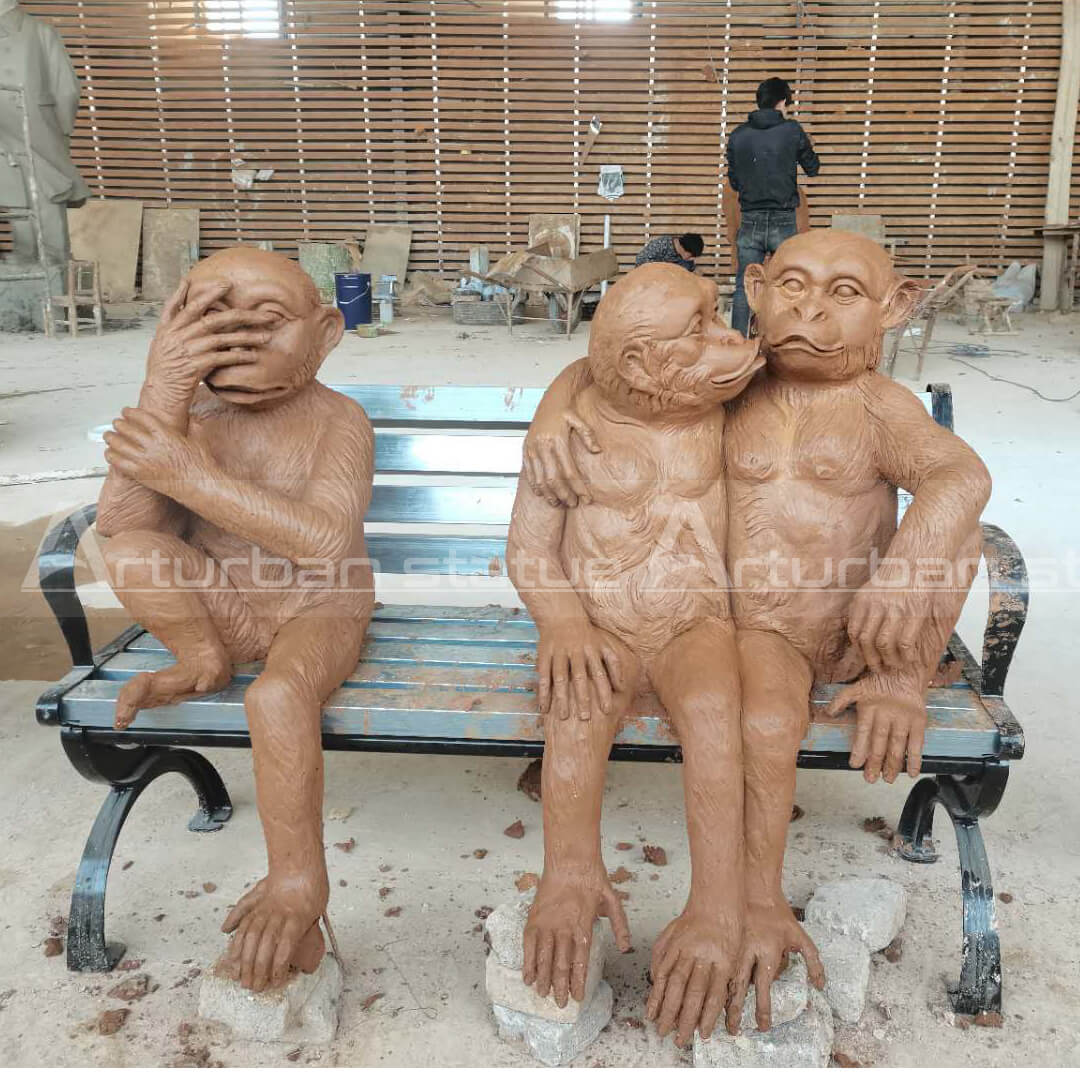 three wise monkeys statue