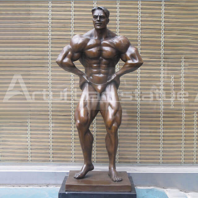 muscle man statue