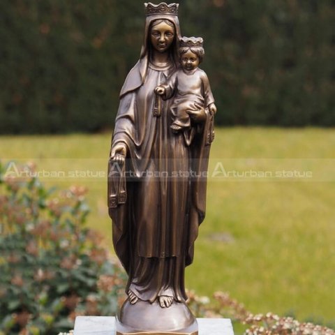 virgin mary holding jesus statue