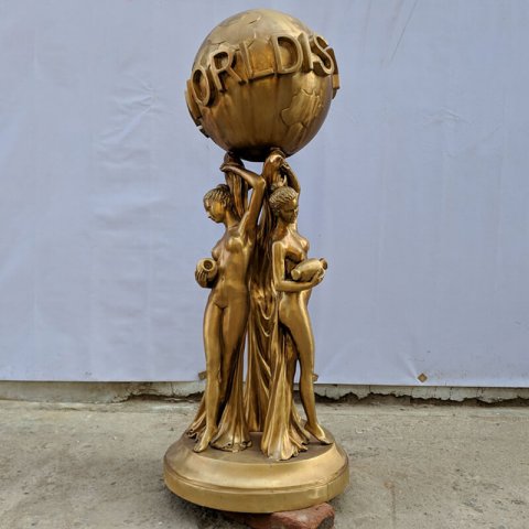 the world is yours globe statue