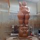 fat female statue