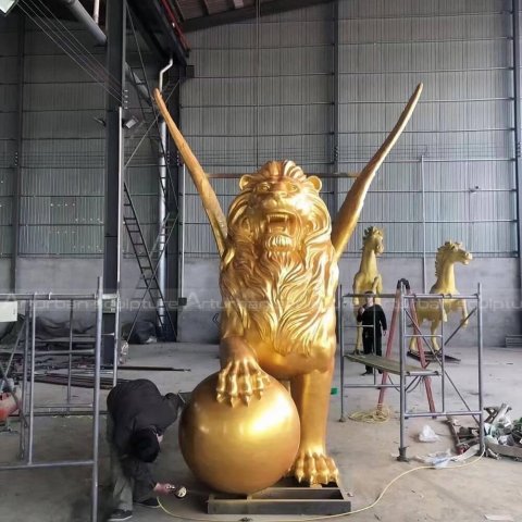 large gold lion statue