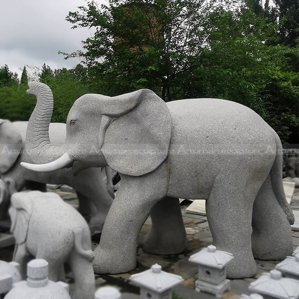 grey stone elephant statue