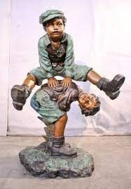 bronze statue of boy