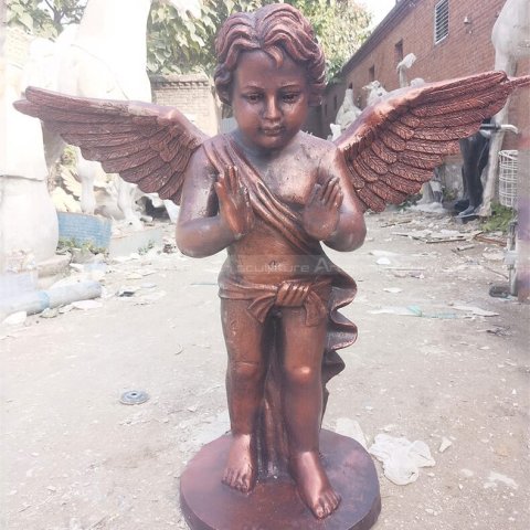 vintage cherub statue