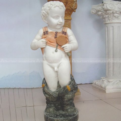 peeing boy sculpture