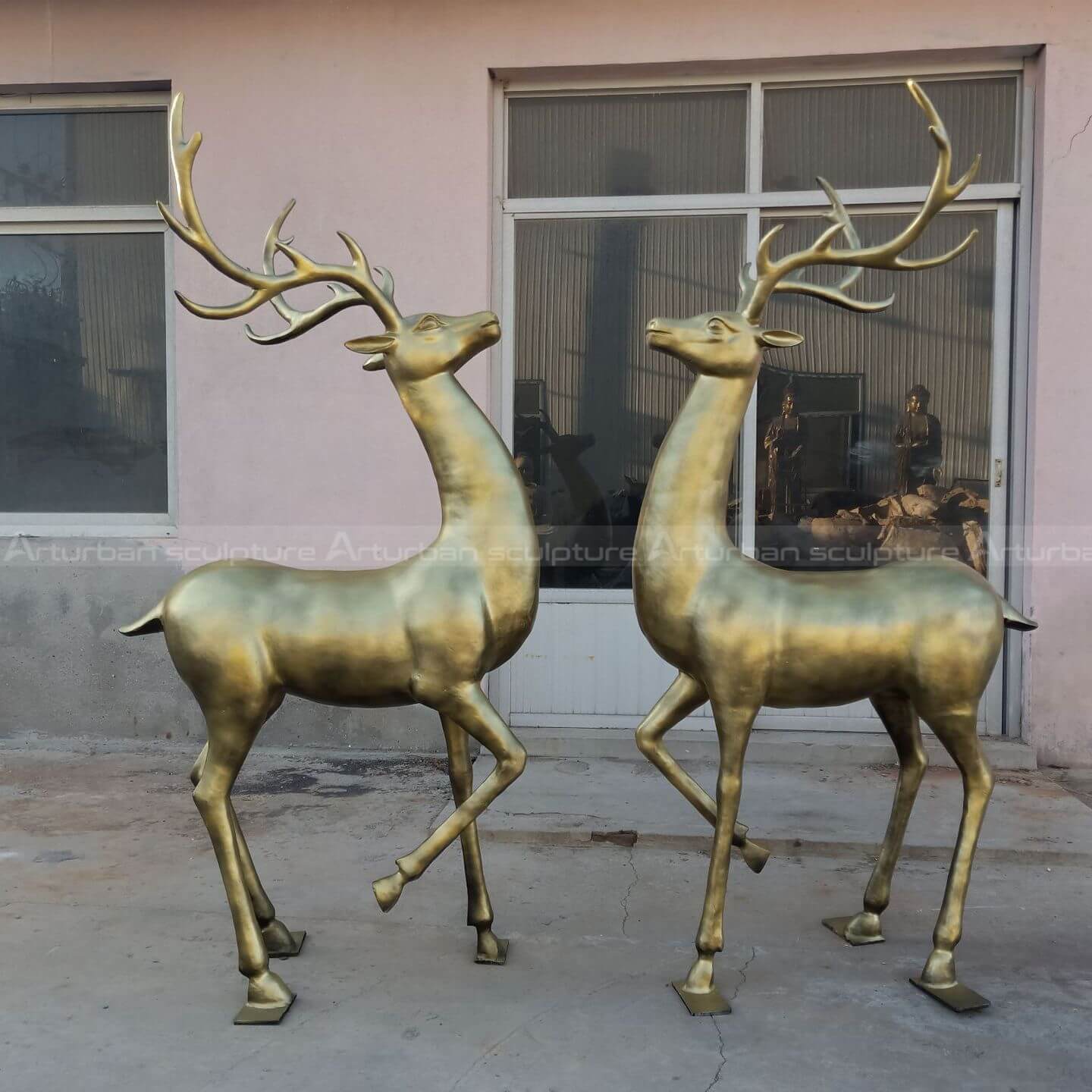 paired deer statue