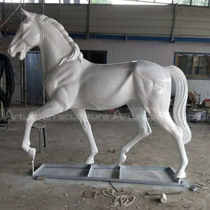 white fiberglass horse statue
