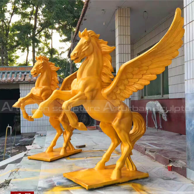 gold horse with wings statue