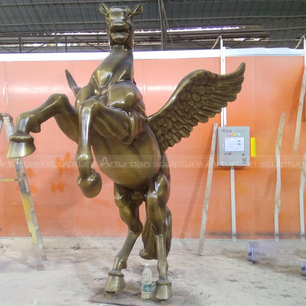 winged animal statue