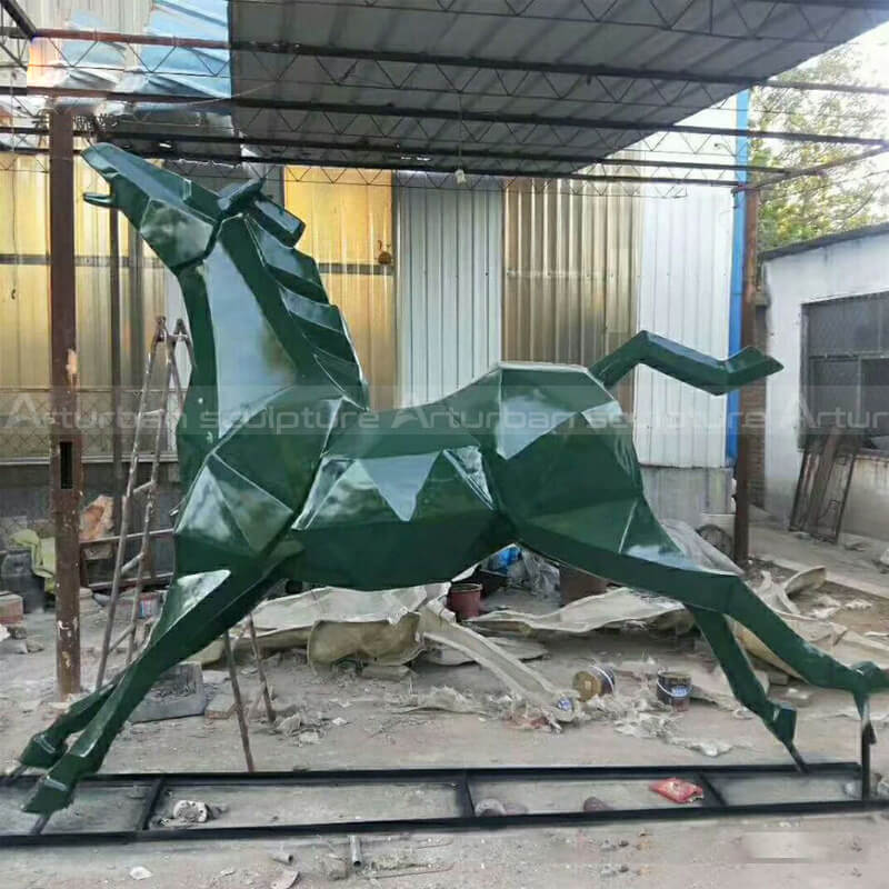 dark green abstract horse sculpture