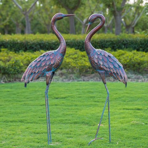 garden heron statues