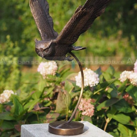 bronze owl sculpture