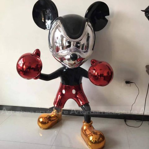 mickey mouse looking statue