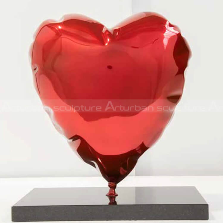 shiny chorme heart statue