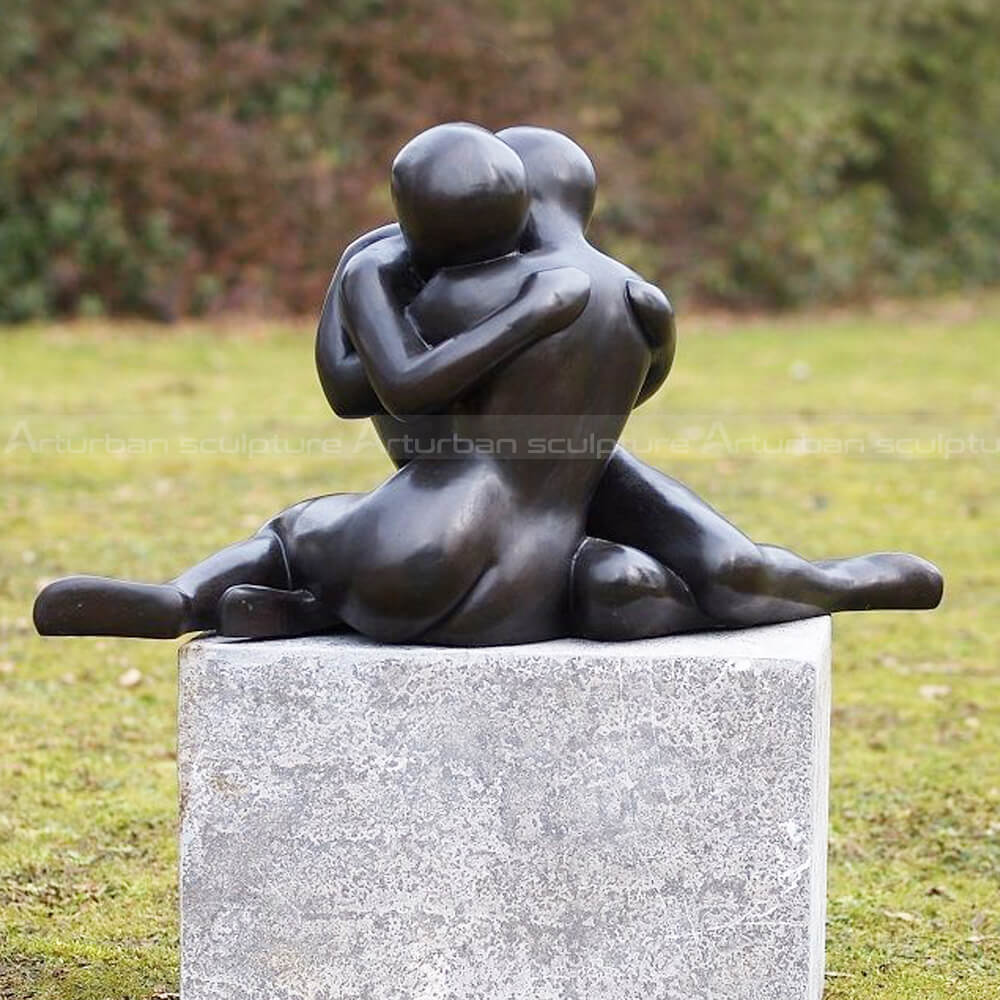 embracing couple sculpture