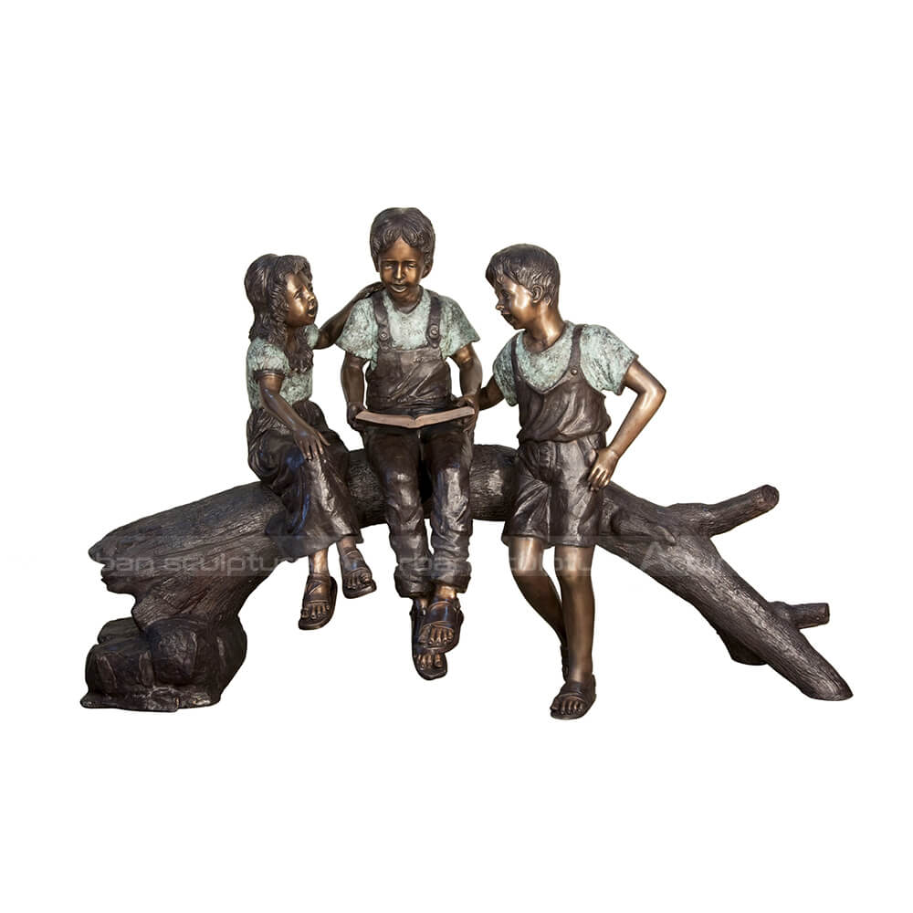 reading boy and girl statue