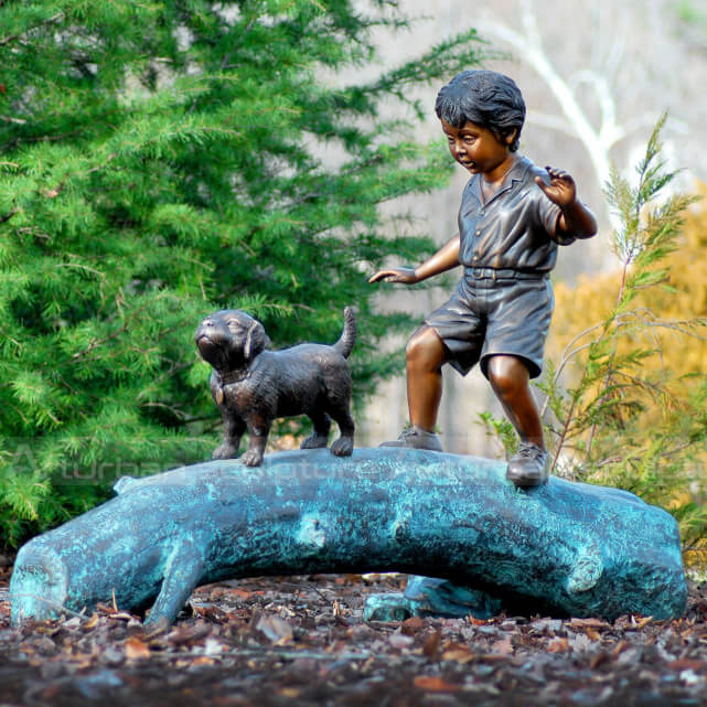 bronze boy and dog statue
