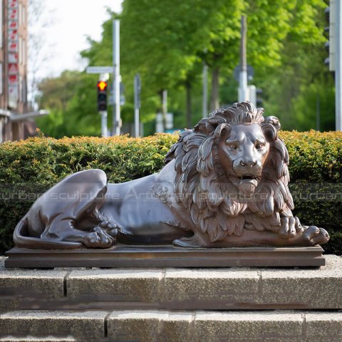 resting lion statue