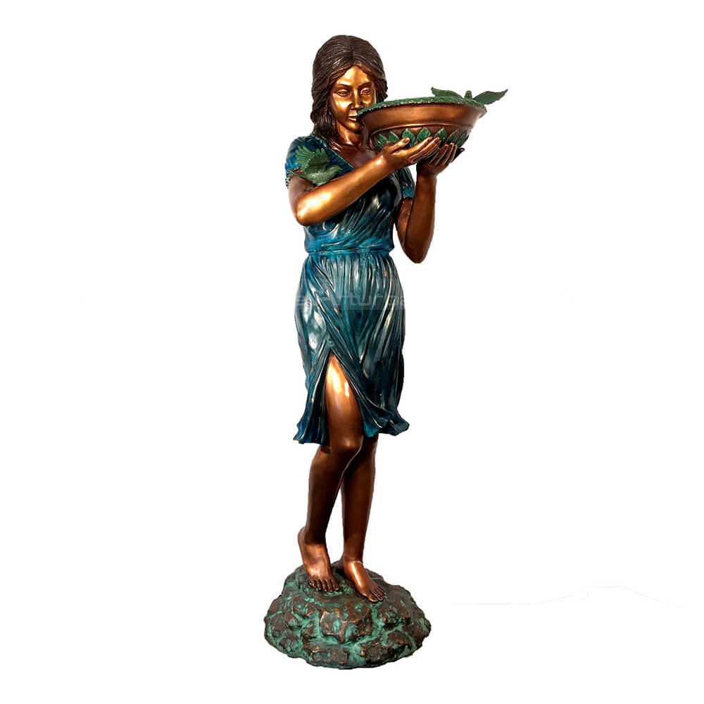 lady statue holding birdbath