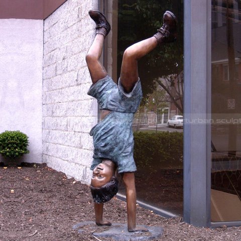handstand boy statue