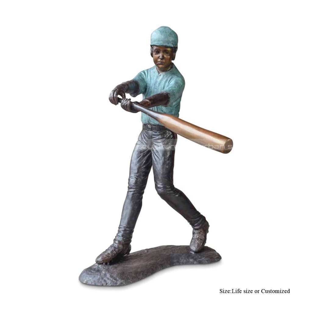 boy playing baseball statue