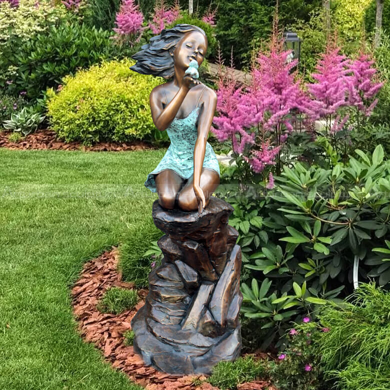 girl with duck sculpture