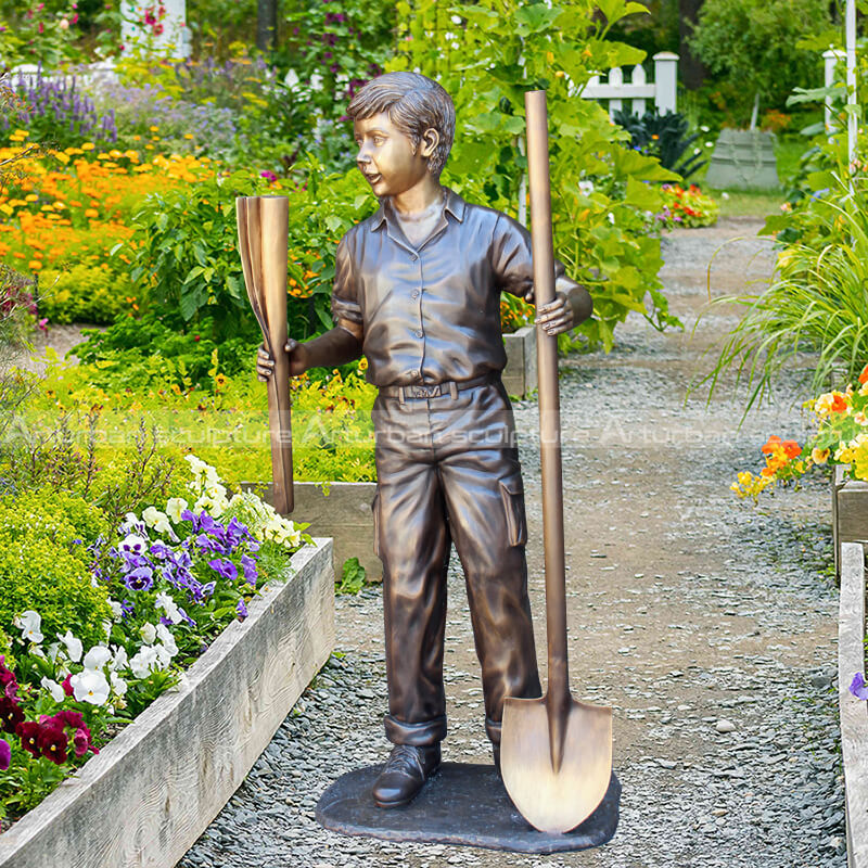 boy with shovel statue
