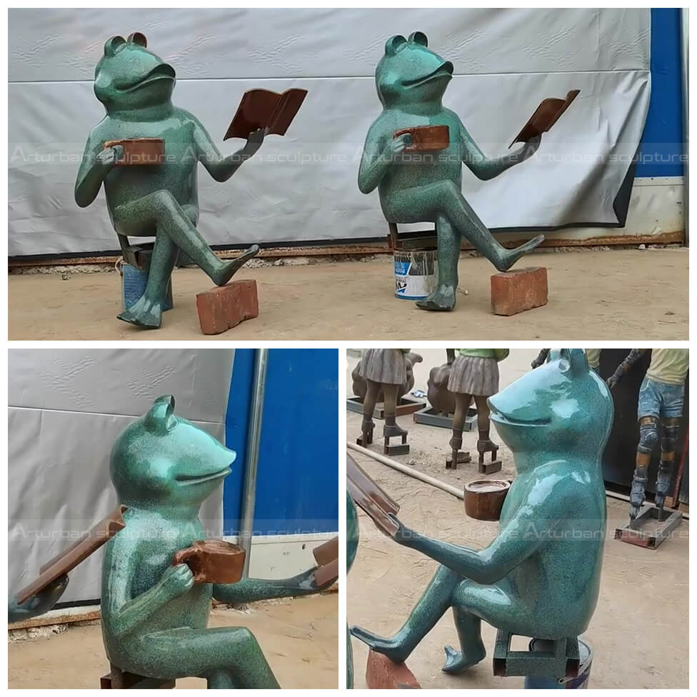 frog reading book statue