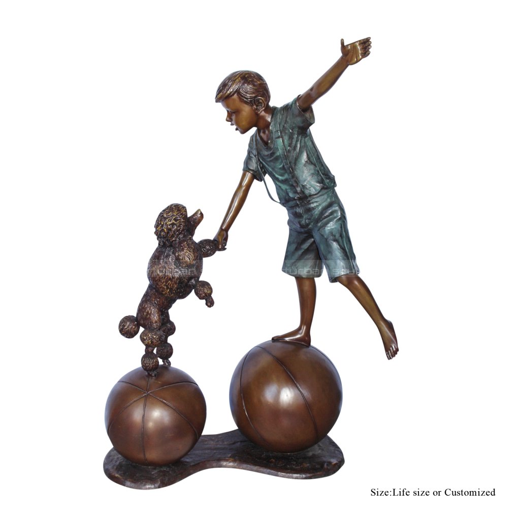 little boy and dog statue