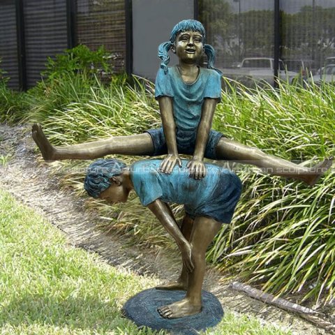 boy and girl leapfrog statue