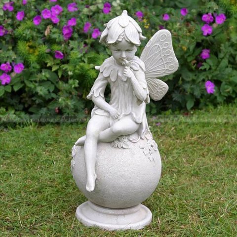 sitting fairy statue