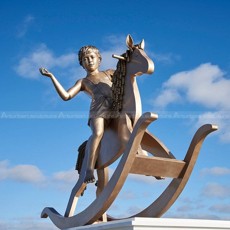 boy on hobby horse sculpture