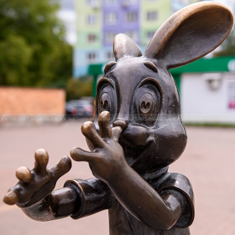 wolf and rabbit sculpture