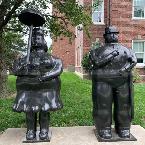 fat woman and man statue