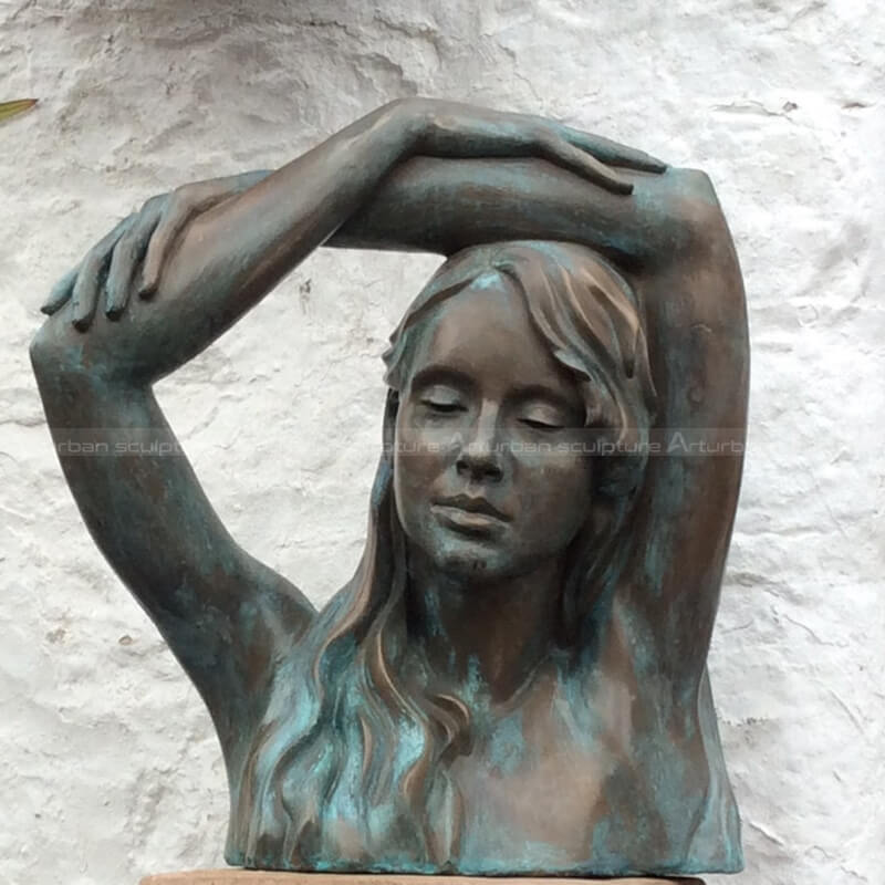 female bronze bust