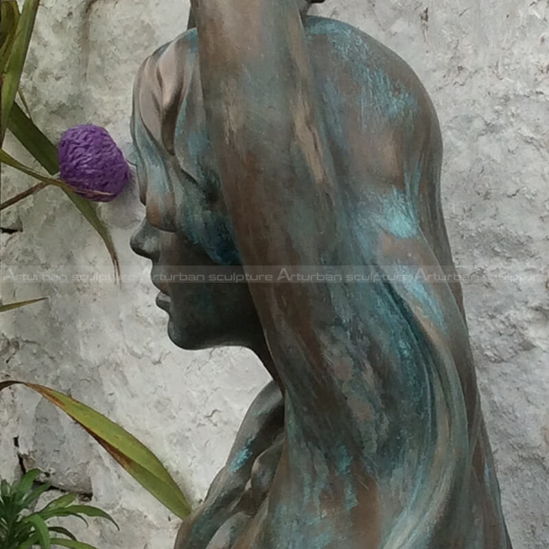 female bronze bust