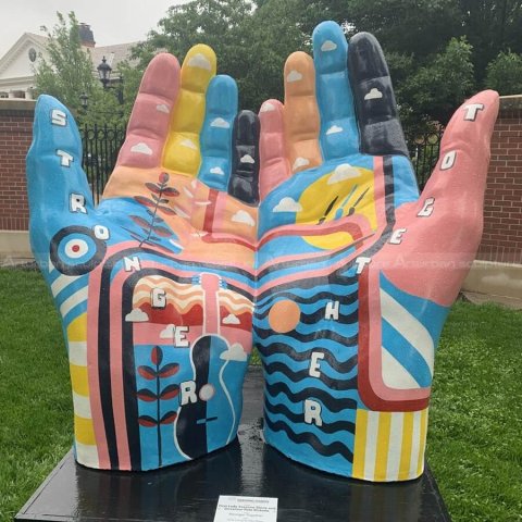 painted hand sculpture