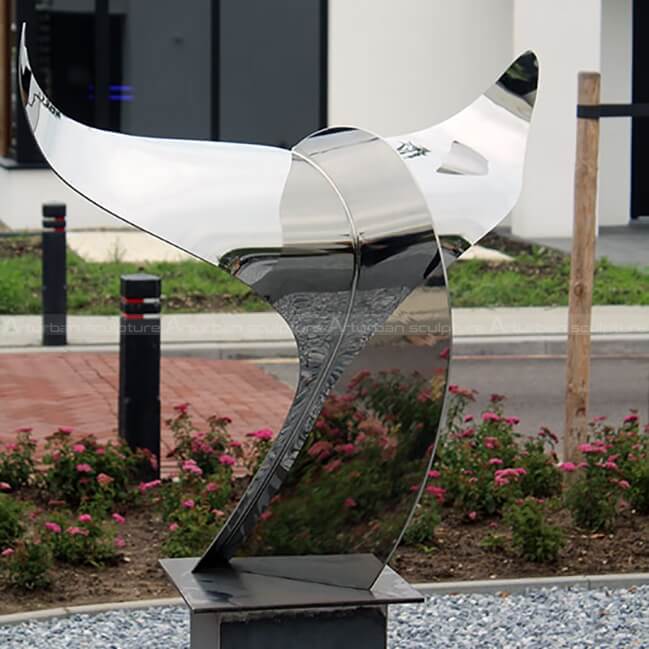 whale tail garden sculpture