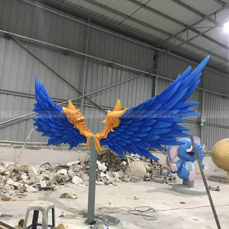 sculpture with wings