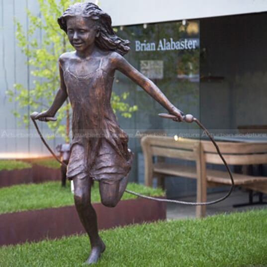 rope skipping girl statue