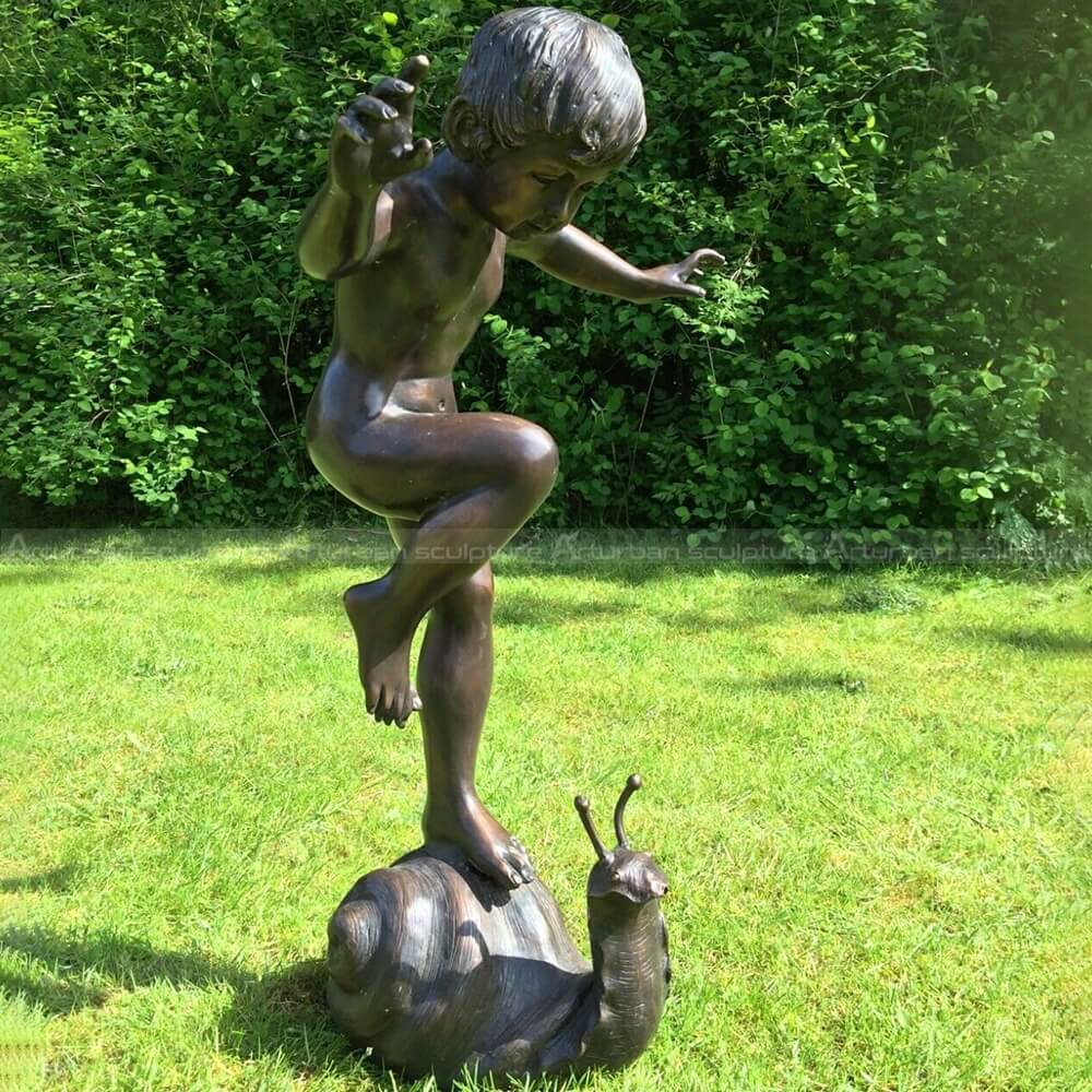 boy and snail statue