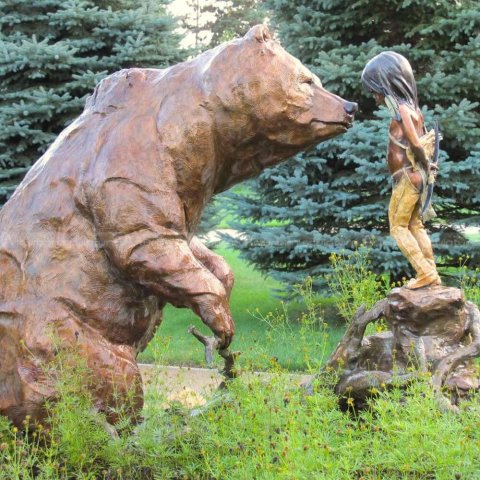 boy and bear bronze sculpture